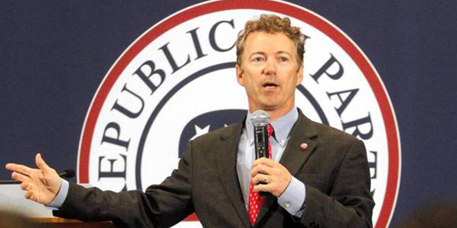 Senator Rand Paul pokes fun at the 140,000 new codes in Obamacare at the Lincoln Day Dinner Republican party GOP fundraiser in Cedar Rapids, Iowa, on May 10, 2013