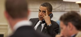 Obama on Phone with Middle Finger Extended