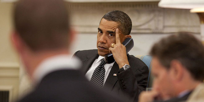 Obama on Phone with Middle Finger Extended