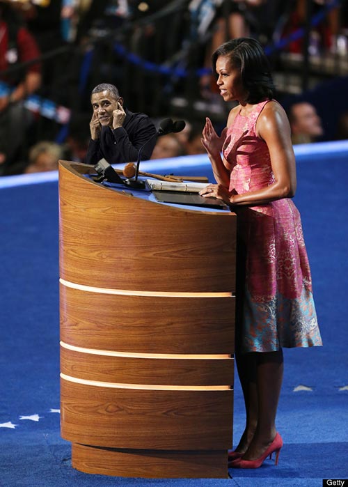 President Obama Booed at College Basketball Game Photoshop Covering His Ears While First Lady Michelle Obama Gives a Speech Oregon State Beavers University of Maryland Terrapins Michelle Obama's brother Craig Robinson head coach crowd booing boos cheers jeers unhappy ACA Obamacare promise keep your plan upset