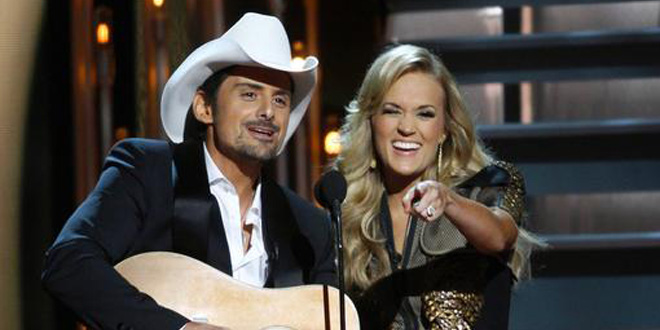 Brad Paisley and Carrie Underwood perform sing duet mock mocking mocked skewer hilarious awesome parody spoof satire hit ode watch Obamacare by Morning at 47th Annual CMA Awards November 6, 2013 Country Music Association ABC Reuters