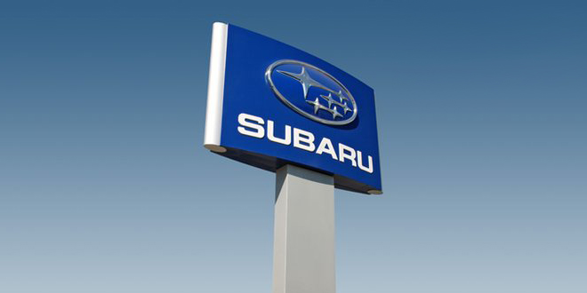 Subaru of Wichita union protesters protest clever signs sign auto car dealership dealer automobile Kansas KS labor dispute fights back fight battle respond responds handle handled handles Carpenters Local 201 "Shame on Subaru of Wichita" "For Having Unbeatable Prices" "For Excessive Shocker Spirit" non-union workers large white banner shame drywall company construction project tactics contractors wages business businesses goons rats