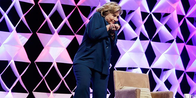 Hillary Clinton Shoe Dodges Shoe Thrown at Her During Las Vegas Speech unidentified woman threw throw throws throwing shoe at Hillary Clinton The Institute of Scrap Recycling Industries former Secretary of State former Senator New York Presidential candidate 2016 election run running campaign office President Alison Michelle Ernst female protester bat Cirque du Soleil solid waste management controversial duck Mandalay Bay casino resort hotel conference auditorium blue dress shoe-thrower delivering remarks Nevada April 10, 2014