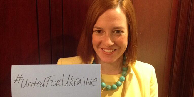 #UnitedForUkraine Twitter hashtag tweet Jen Psaki State Department spokesperson spokeswoman spokesman Ukraine Russia Ukrainian Crimea Crimean annex situation standoff invasion tension Russian President Vladimir Putin tweets tweeting tweeted Russian Foreign Ministry hijack hijacked hijacking hijacks mock mockery mocks mocking mocked lampoon make fun of made fun of ridicule embarrass embarrassment ensue ensues Russian Foreign Minister Sergey Lavrov John Kerry Secretary of State red line President Obama administration foreign policy foreign affairs diplomacy diplomatic yellow dress red hair white card sign @statedeptspox Twitter account negotiation negotiations