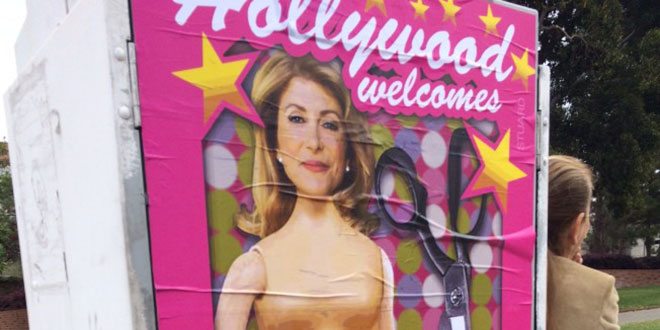 'Hollywood Welcomes Abortion Barbie Wendy Davis' posters poster Sabo Los Angeles L.A. artist subversive street art political conservative life-sized Democrat Democratic gubernatorial candidate Texas governor fundraiser traffic signal boxes greeted by plaster plastered Republican opponent Greg Abbott GOP guerrilla Red State Erick Erickson baby belly cut out scissors late-term partial birth abortions filibuster campaign edgy Kathryn Stuard Midland woman commissioned commission shock shocking satire satirical offensive demean demeaning