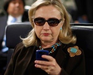 Hillary Clinton Blackberry sunglasses airplane email server scandal Secretary of State classified information